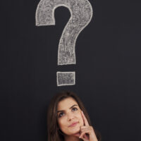 Big question mark on blackboard